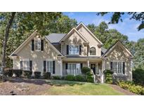 Two story house with landscaping and stone accents at 1400 Lamont Cir, Dacula, GA 30019