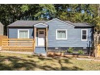 Charming craftsman style home with gray siding and a wooden deck at 205 Maple St, Atlanta, GA 30354