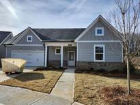 Charming two-story home with gray siding, white trim, and a covered entryway at 304 Bunker Hill Ct, Acworth, GA 30102