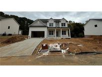 Two-story house with gray siding and white trim at 316 Level Creek Rd, Sugar Hill, GA 30518
