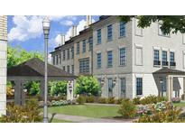 Townhouses with landscaped courtyard and gazebo at 625 Mayfair Ct, Alpharetta, GA 30009