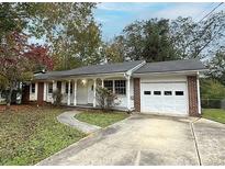 Brick ranch house with attached garage at 6030 Danbury Ct, Morrow, GA 30260