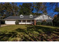 Charming ranch home with mature landscaping and attached garage at 3766 Citation Dr, Decatur, GA 30034