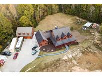 Aerial view of house and expansive property at 2260 Wilzman Trl, Conyers, GA 30012