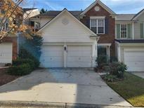Two story home with attached two car garage at 183 Regent Pl, Woodstock, GA 30188