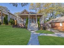 Charming craftsman style house with a front porch at 1171 Oak Sw St, Atlanta, GA 30310