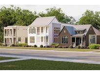 New homes in a community with various architectural styles at 172 Railroad St, Canton, GA 30114