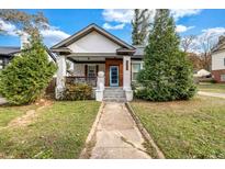 Charming renovated bungalow with a welcoming front porch at 3220 Dogwood Dr, Hapeville, GA 30354