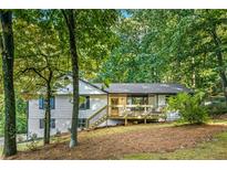 Charming ranch home with a newly renovated deck and landscaping at 2152 Tourney Dr, Marietta, GA 30062