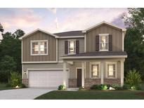Two-story home with neutral siding, brick accents, and a two-car garage at 4175 Viola Pl, Atlanta, GA 30349