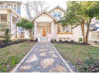 Charming renovated craftsman home with stone path and landscaped lawn at 335 4Th Ne St, Atlanta, GA 30308