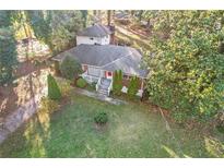 Brick ranch house with spacious yard and detached garage at 2081 Dodson Sw Dr, Atlanta, GA 30311