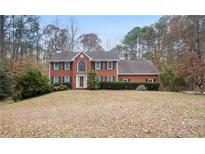 Brick two-story house with large yard at 4979 Lost Mountain Nw Trce, Kennesaw, GA 30152