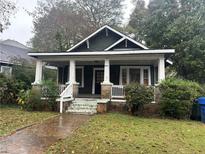 Charming craftsman home with front porch and stone accents at 603 Willard Sw Ave, Atlanta, GA 30310