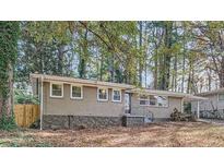 Ranch style home with a newly landscaped yard at 1374 Margarette Dr, Decatur, GA 30035