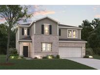 Two-story house with brick and siding exterior, attached garage, and landscaped lawn at 7037 Brushwood Bend, Lithonia, GA 30058