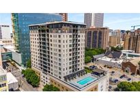 High-rise building with rooftop pool; city views at 565 Peachtree Ne St # 1209, Atlanta, GA 30308