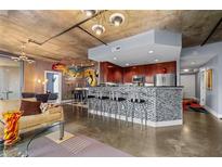 Modern kitchen with stainless steel appliances and granite countertops at 285 Centennial Olympic Park Nw Dr # 401, Atlanta, GA 30313