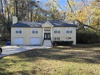 Beautiful two-story house with a two-car garage and well-maintained lawn at 5005 Dublin Dr, South Fulton, GA 30331
