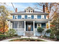 Charming two-story blue home with white columns and porch at 118 Waverly Ne Way, Atlanta, GA 30307