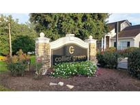 Collier Green community entrance sign with landscaping at 1150 Collier Nw Rd # 4B, Atlanta, GA 30318