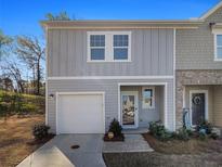 Charming two-story home with a one-car garage and a welcoming front porch at 2680 Senegal Way # 88, Atlanta, GA 30331