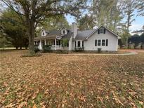 Ranch home with a covered porch and a large yard at 120 Black Rock Ct, Fayetteville, GA 30214