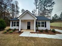 Charming new construction home with a covered front porch at 3 Forkwood Cir, Hiram, GA 30141