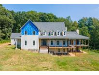 Large two-story home with a wrap-around porch under construction at 772 Old Lathemtown And 776 Rd, Canton, GA 30115