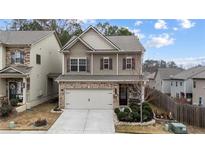 Charming two-story home with a welcoming front porch and landscaped yard at 111 Bryon Ln, Acworth, GA 30102