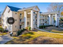 Attractive exterior of a multi-unit residential building with landscaping at 706 Berry Ct, Villa Rica, GA 30180