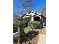 Charming Craftsman home with front porch and mature landscaping at 1839 Lakewood Ave, Atlanta, GA 30315