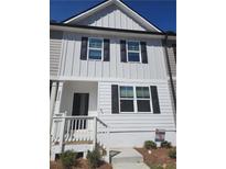 Two-story home with white siding, black shutters, and a front porch at 2822 Saratoga Lake Vw, Decatur, GA 30034