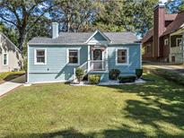 Charming light blue house with a well-manicured lawn at 468 Pasley Se Ave, Atlanta, GA 30316