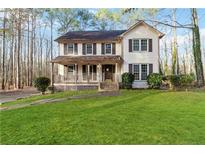 Two-story house with a large front yard and porch at , Fayetteville, GA 30214