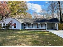 Ranch home with front porch and attached carport at 5148 Pine Cliff Tarn, Acworth, GA 30102