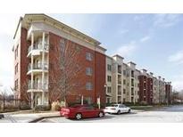 Brick building with multiple floors and balconies at 870 Mayson Turner Nw Rd # 1110, Atlanta, GA 30314