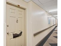 Building hallway with beige walls and carpeting at 300 Johnson Ferry Ne Rd # B413, Atlanta, GA 30328