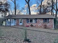 Brick ranch house with a spacious yard at 568 Maran Sw Ln, Mableton, GA 30126