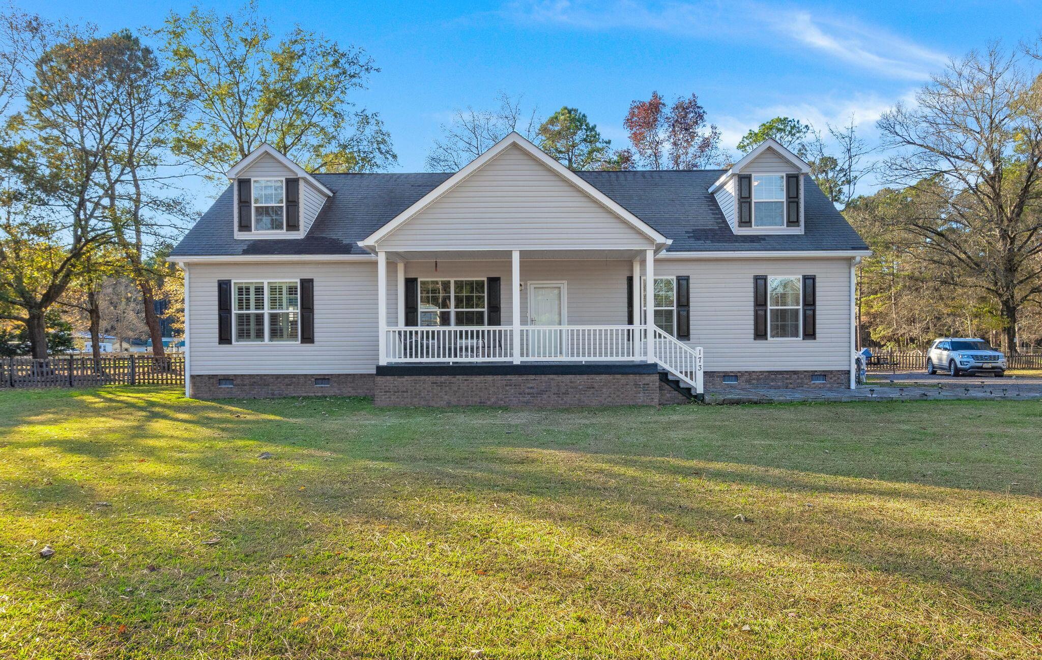 Photo one of 173 E Meadow Dr Ridgeville SC 29472 | MLS 24008075