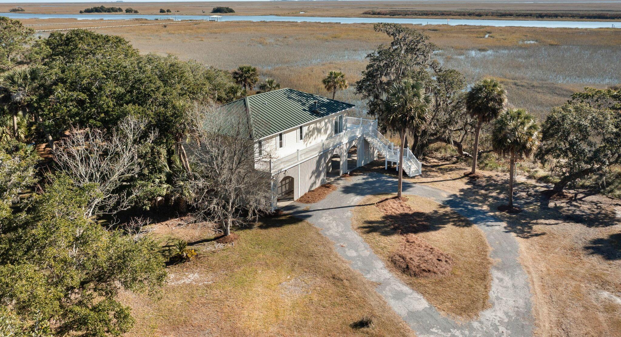 Photo one of 9681 Two Pines Rd McClellanville SC 29458 | MLS 24030651