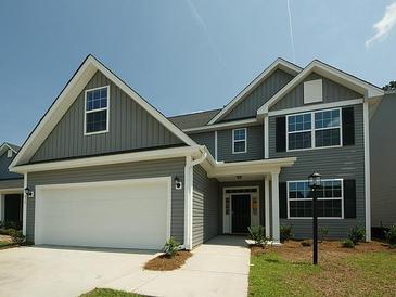 Two story house with gray vinyl siding, white garage door, and black shutters at 420 Eagleview Dr, Moncks Corner, SC 29461