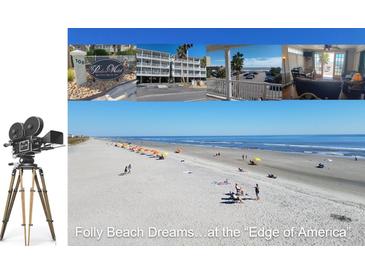 Aerial view of beach, parking, and building at 106 W Arctic Ave # 1D, Folly Beach, SC 29439
