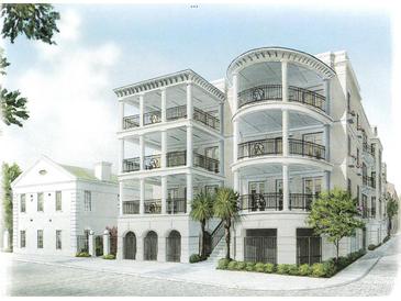 Three-story building with balconies and white columns at 5 Middle Atlantic Wharf # 3A, Charleston, SC 29401