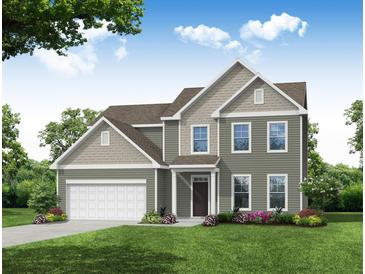 Two story house with gray siding, white garage door and landscaping at 119 Ashley Cove Way, Summerville, SC 29483