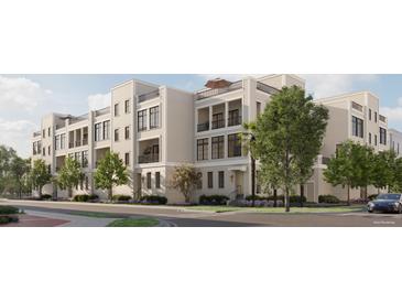 Modern townhouses with balconies and landscaping, located near a street at 618 Waterman St # 618, Charleston, SC 29492