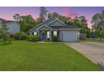 One-story house with gray siding, blue door, and attached garage at 166 Blackstone Dr, Moncks Corner, SC 29461