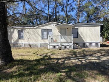 Charming single-story home with front porch and yard at 224 Ruth Anne Dr, Summerville, SC 29483