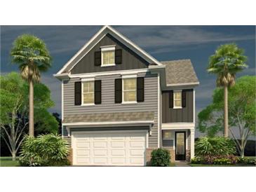 Two-story home with gray siding, white trim, and a two-car garage at 327 Dickerson Ln, Summerville, SC 29485