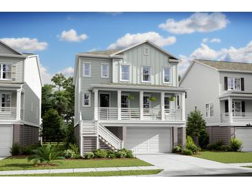Two-story craftsman home with light gray siding, white trim, and a front porch at 1661 Siloh Dr # 492, Mount Pleasant, SC 29466